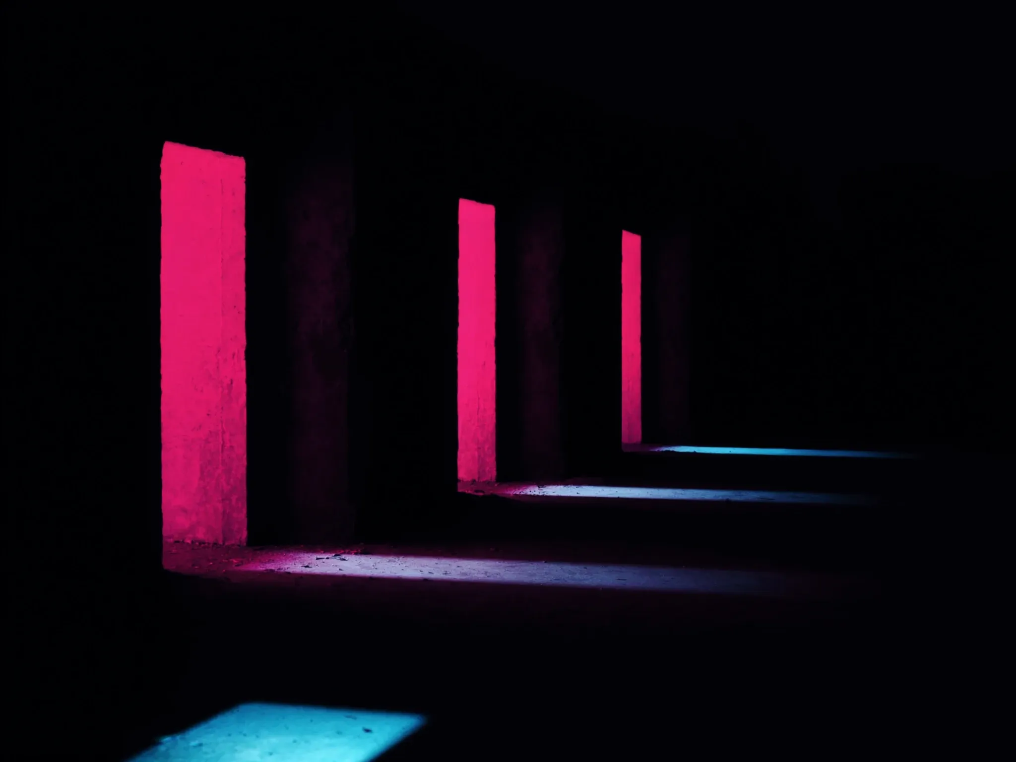 Pink light falling through a sequence of doorways in a dark concrete corridor, each frame lit exactly the same